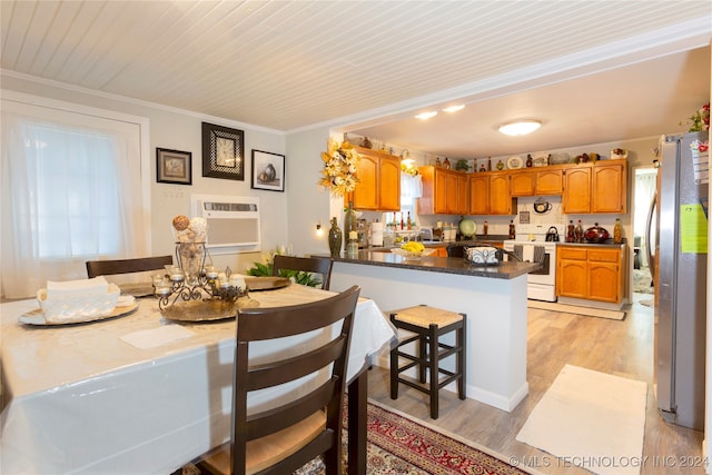 dining room featuring wooden ceiling, crown molding, light wood-type flooring, and plenty of natural light