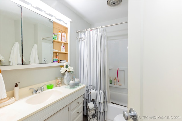 bathroom with vanity and shower / tub combo