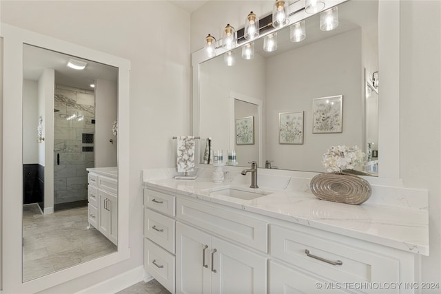 bathroom with vanity and an enclosed shower