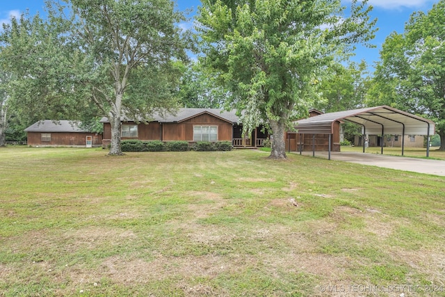 view of yard with a carport