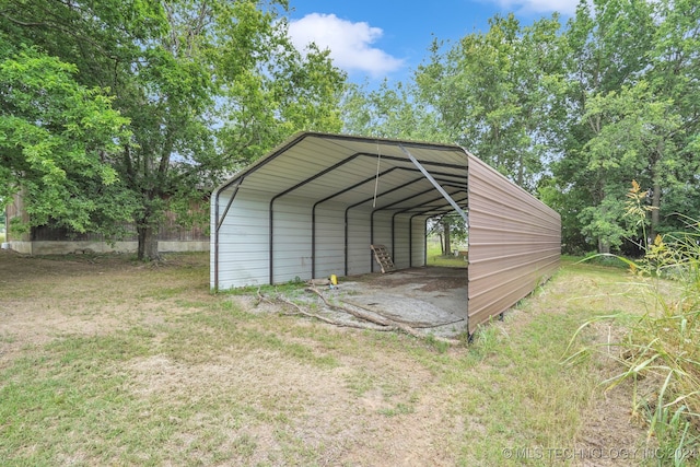 view of outbuilding featuring a carport