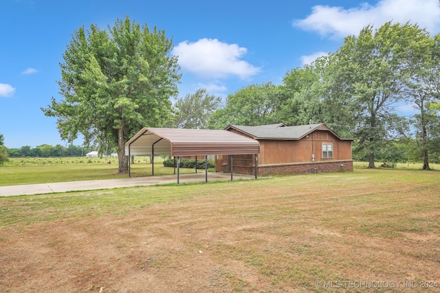 view of yard with a carport