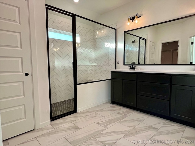 bathroom with vanity and walk in shower