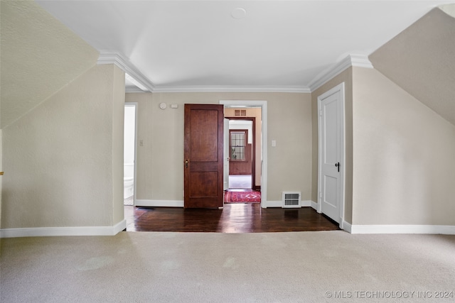 entryway with crown molding, hardwood / wood-style flooring, and a wealth of natural light