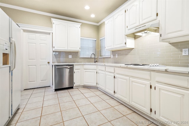 kitchen with white appliances, white cabinetry, and light tile patterned floors