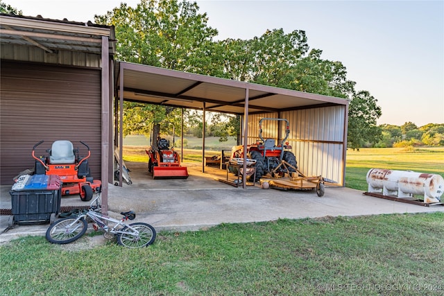 exterior space featuring a yard and an outbuilding