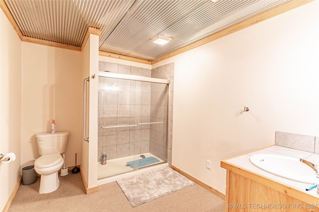 bathroom with vanity, toilet, and an enclosed shower