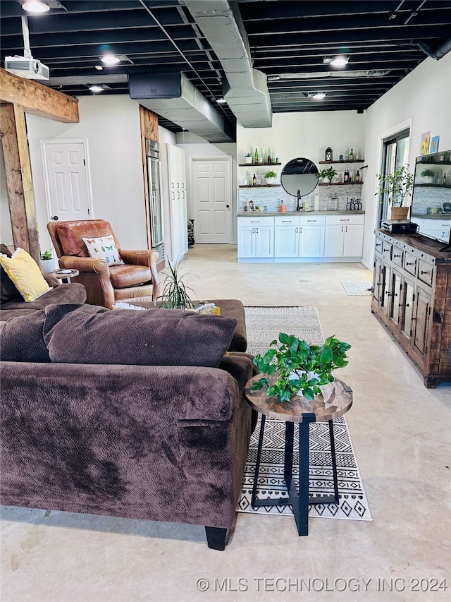 living room featuring indoor bar