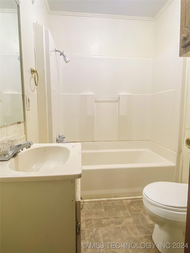 full bathroom with vanity, toilet, crown molding, and bathing tub / shower combination