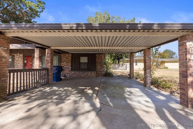 view of patio / terrace with a carport