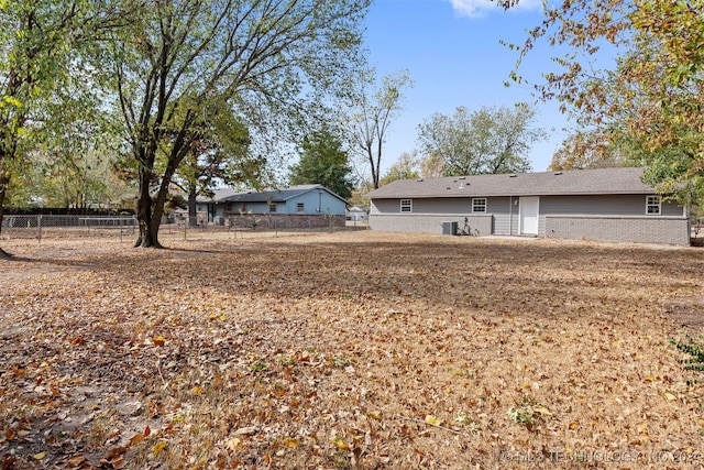 view of yard with central AC