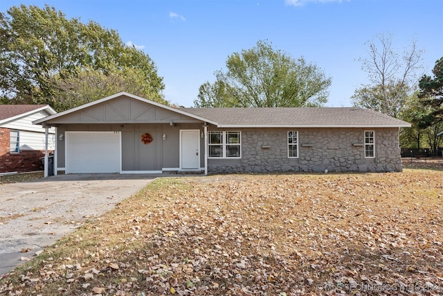 single story home featuring a garage