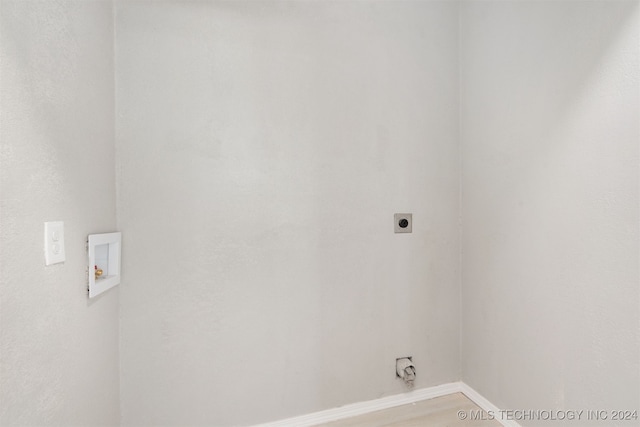 laundry area with electric dryer hookup and washer hookup