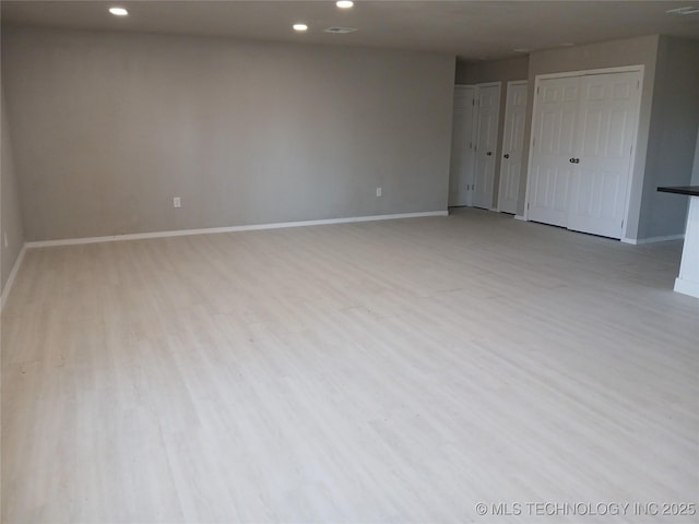 empty room with light wood-type flooring