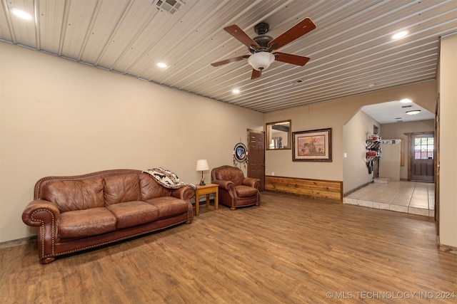 living room with ceiling fan, wood ceiling, and hardwood / wood-style floors