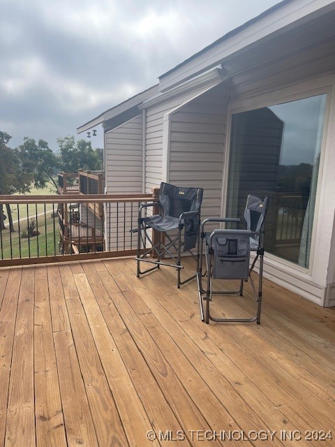 123 Falconhead Unit B, Burneyville, OK 73430 - view of wooden terrace