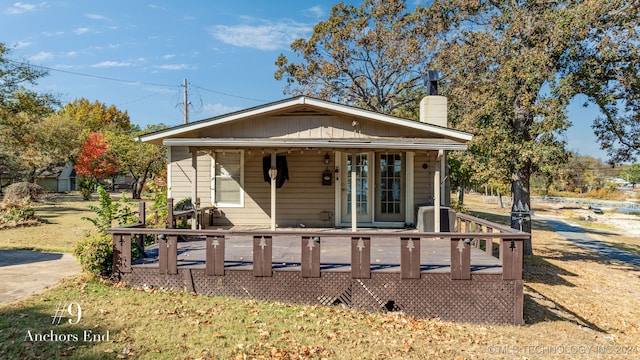 bungalow featuring a swimming pool