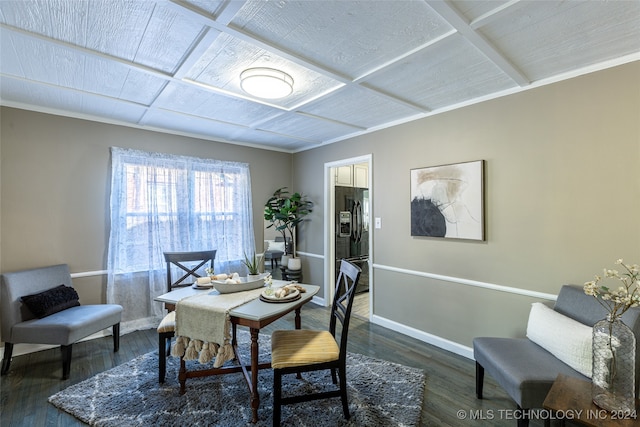 dining space with crown molding and dark hardwood / wood-style floors