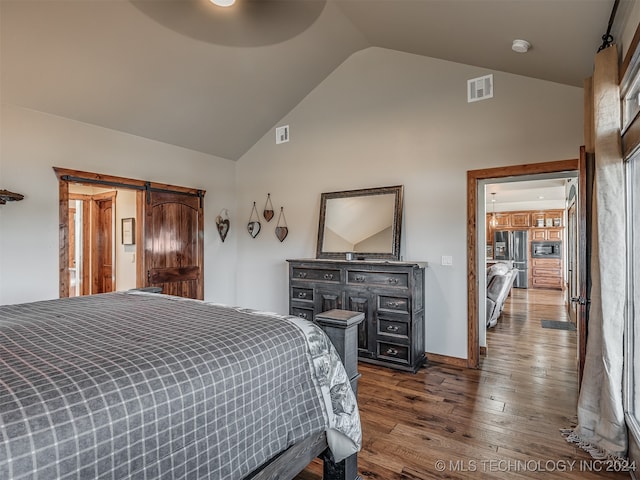 bedroom with ceiling fan, stainless steel fridge with ice dispenser, a barn door, high vaulted ceiling, and dark wood-type flooring