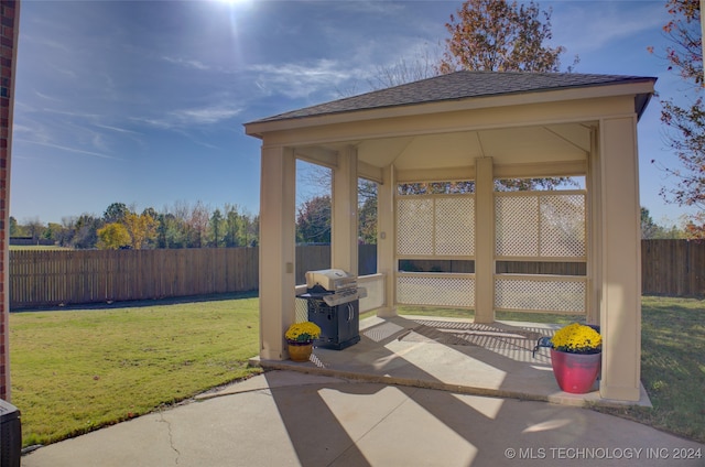 view of patio featuring area for grilling and a gazebo