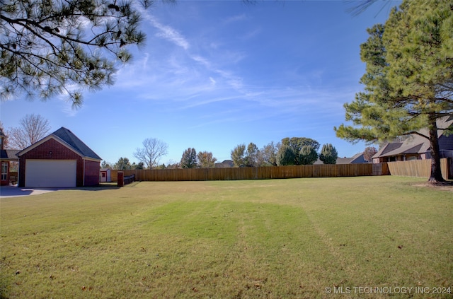 view of yard featuring a garage