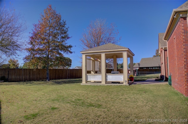 view of yard with a gazebo and a patio