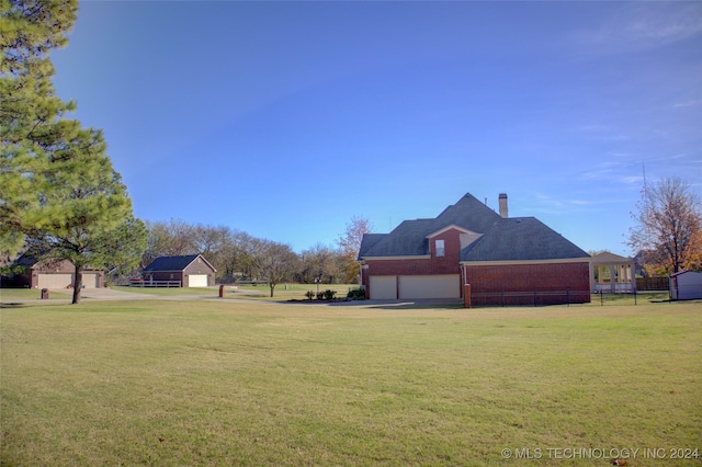 view of yard with a garage