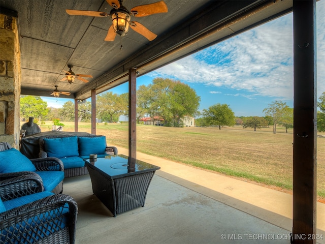 view of patio featuring outdoor lounge area and ceiling fan