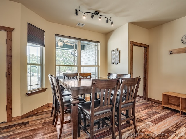 dining area featuring hardwood / wood-style flooring