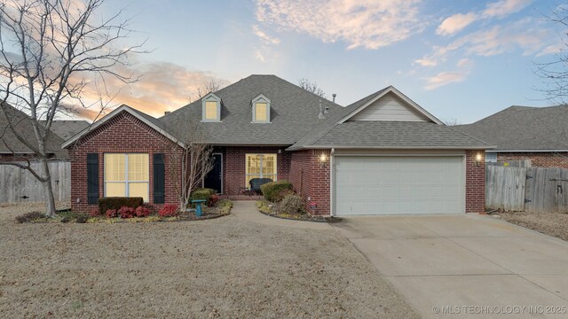 view of front of home with a garage