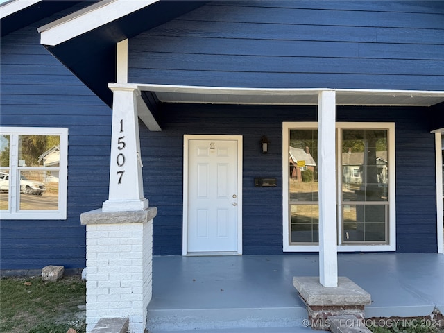 property entrance with a porch