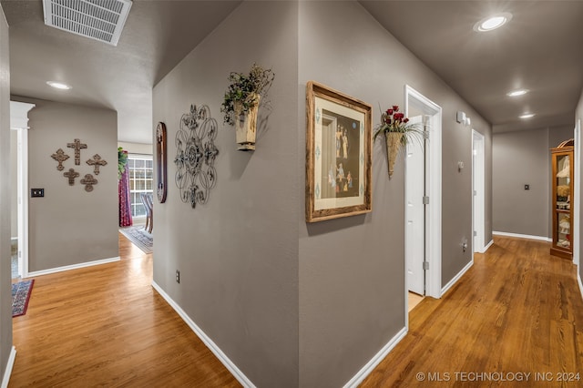 hallway featuring light hardwood / wood-style flooring