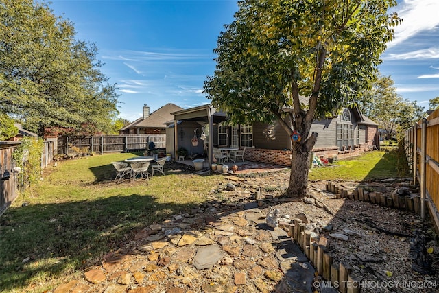 view of yard with a patio