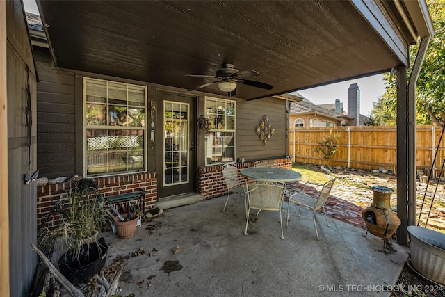 view of patio featuring ceiling fan