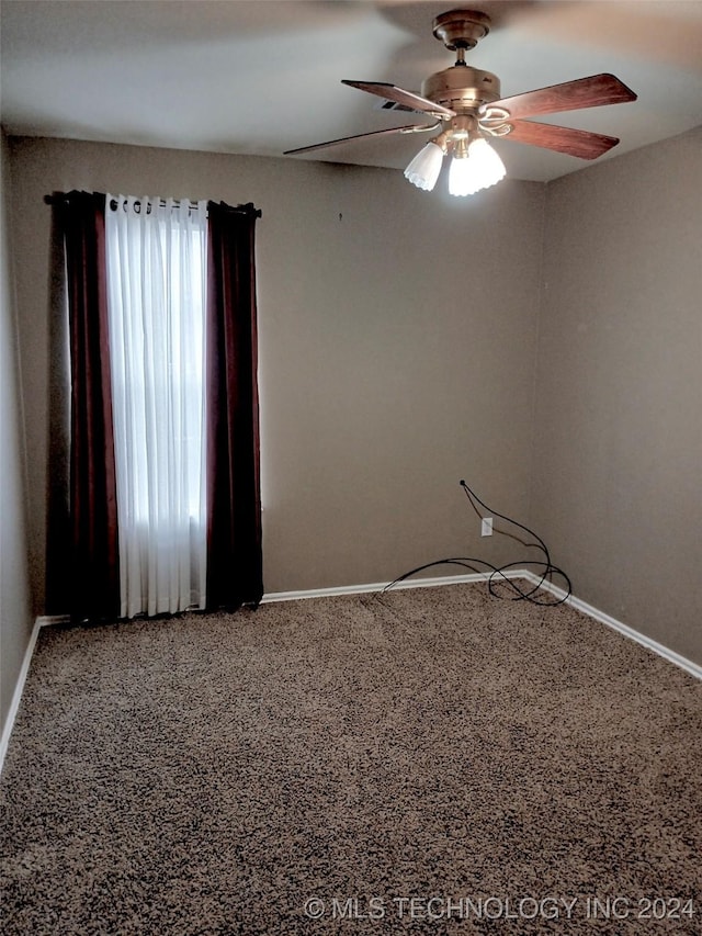 unfurnished room featuring ceiling fan