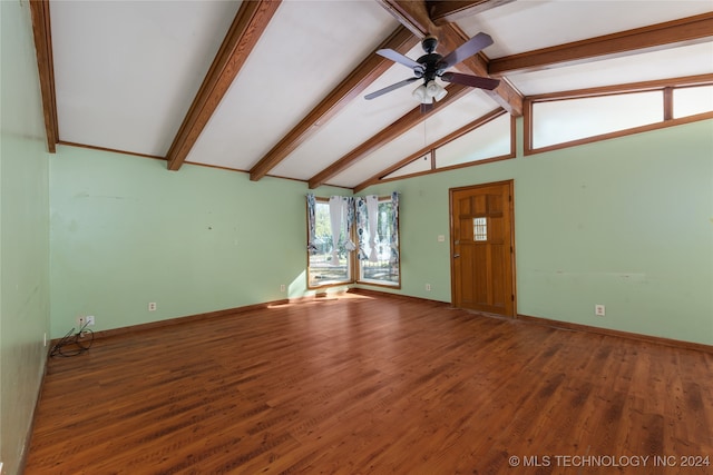 unfurnished living room with vaulted ceiling with beams, hardwood / wood-style flooring, and ceiling fan