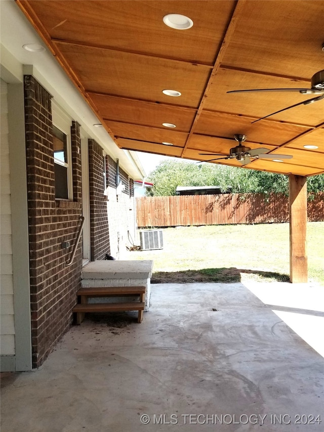 view of patio / terrace with central air condition unit and ceiling fan