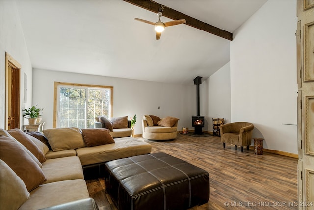 living room featuring vaulted ceiling with beams, a wood stove, wood-type flooring, and ceiling fan