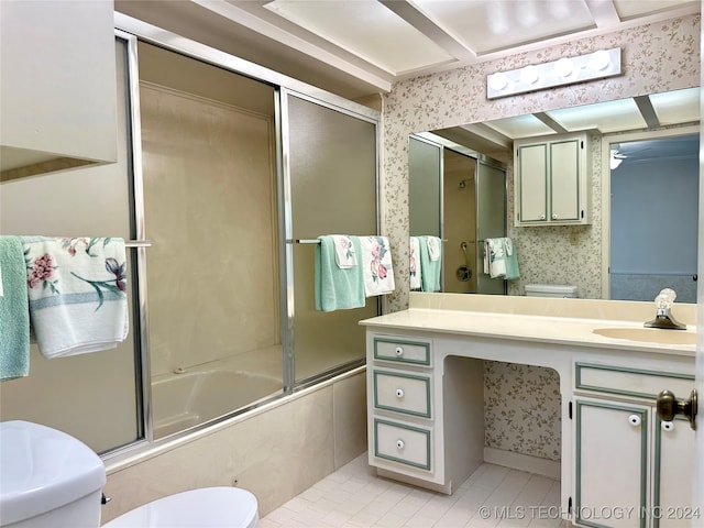 full bathroom with vanity, toilet, tile patterned floors, and enclosed tub / shower combo