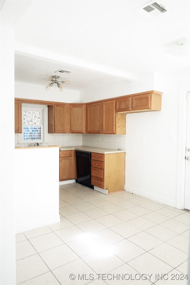 kitchen featuring black dishwasher, light tile patterned flooring, tasteful backsplash, and ceiling fan