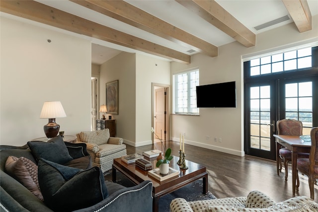 living room with french doors, beam ceiling, and dark wood-type flooring