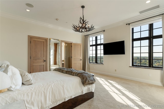 carpeted bedroom featuring crown molding, multiple windows, and an inviting chandelier