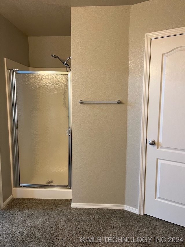 bathroom featuring walk in shower