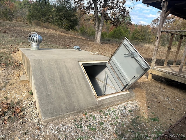 view of entry to storm shelter