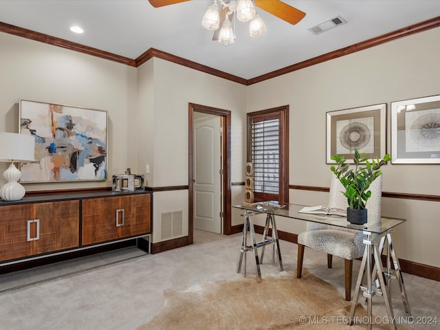 office area with light carpet, crown molding, and ceiling fan