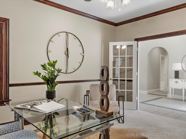 home office with light tile patterned floors, ornamental molding, and an inviting chandelier