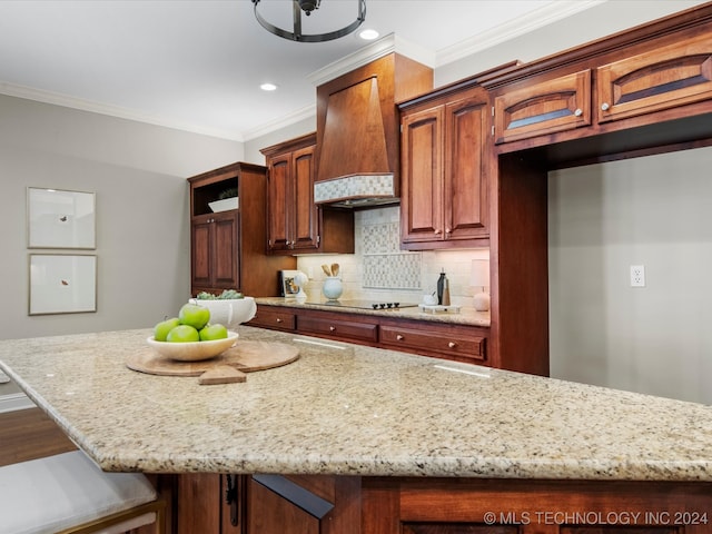 kitchen featuring black electric stovetop, ornamental molding, custom exhaust hood, light stone counters, and decorative backsplash