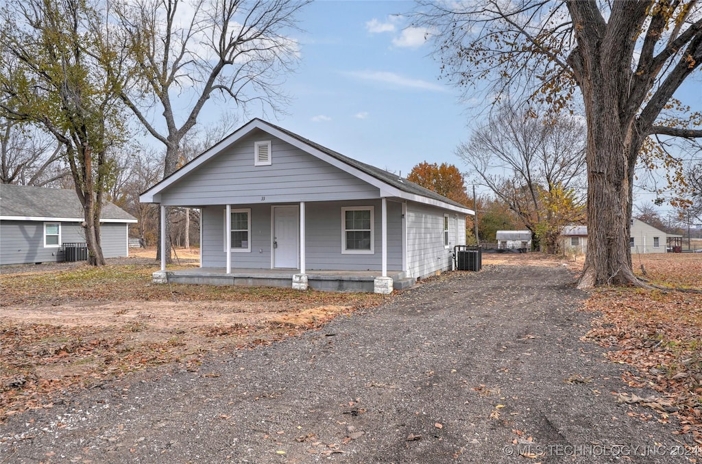 view of front of home featuring covered porch and central AC unit