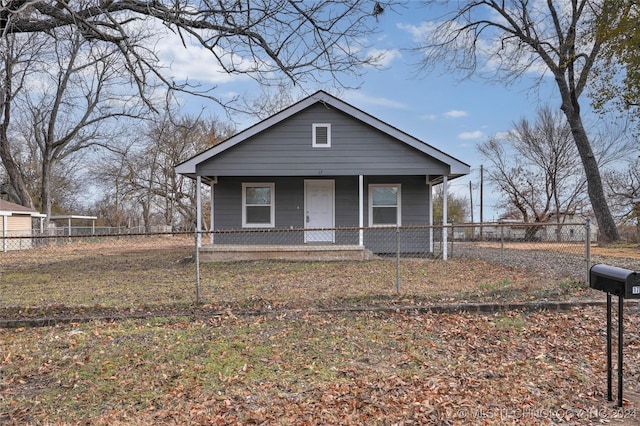 bungalow-style home with a porch