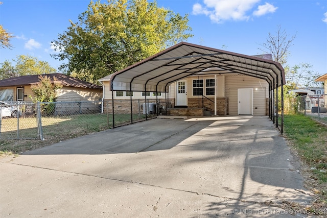 exterior space with a carport